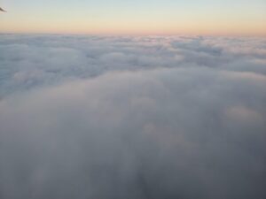 flying over clouds